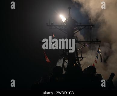 The guided-missile destroyer USS Gravely (DDG 107) launches Tomahawk Land Attack Missiles in response to increased Iranian-backed Houthi malign behavior in the Red Sea Jan. 12, 2024. As a part of the USS Dwight D. Eisenhower Carrier Strike Group, Gravely is deployed to the U.S. 5th Fleet area of operations to support maritime security and stability in the Middle East. (U.S. Navy photo by Mass Communication Specialist 1st Class Jonathan Word) Stock Photo