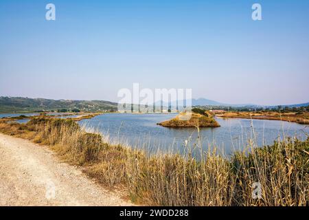 View of Gialova lagoon. The Gialova lagoon is one of the most important wetlands in Europe because it constitutes the southernmost migratory station o Stock Photo