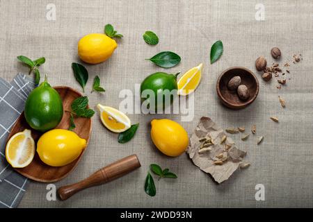 lemon with lime and slices on canvas background Stock Photo