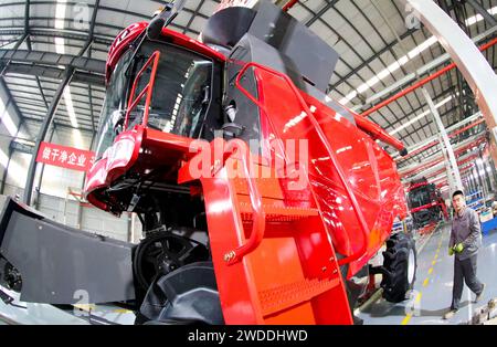 GAOMI, CHINA - JANUARY 20, 2024 - Photo taken on Jan 20, 2024 shows agricultural machinery products coming off the production line at an agricultural Stock Photo