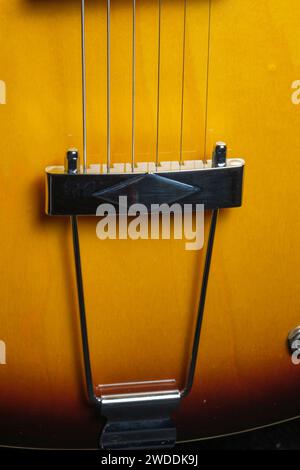 Floating bridge of sunburst Electric guitar and strings Stock Photo