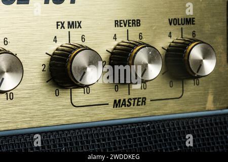 Detail of Guitar amplifier.controls, power, speaker. Stock Photo