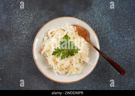 Sauerkraut - fermented cabbage with carrot  in the bowl Stock Photo