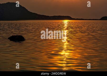 Sunset at the gialova lagoon. The gialova lagoon is one of the most important wetlands in Europe. Greece. Stock Photo
