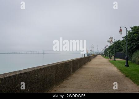 View of the beach promenade on a misty morning in the town of Honfleur, Normandy, France Stock Photo