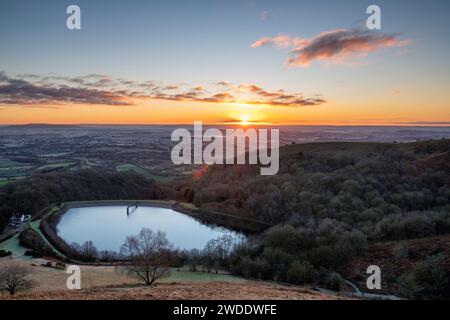 Winter sunrise over the British Camp Reservoir. Malvern hills, Worcestershire, England Stock Photo