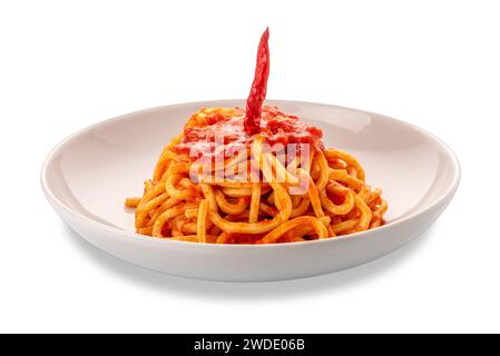 Square spaghetti, called spaghetti alla chitarra in Italy, pasta Arrabbiata topped with red tomato chili sauce in a white plate isolated on white with Stock Photo