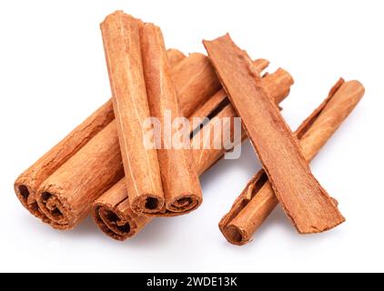 Cinnamon sticks on a white background. Nice spices cinnamon background for your projects. Stock Photo