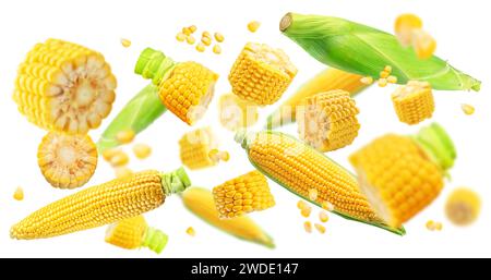 Pieces of corn cobs and maize cobs flying in the air close up. Macro shot. Stock Photo