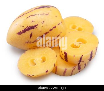 Pepino melon or pepino dulce and sliced fruit isolated on white background. Clipping path. Stock Photo