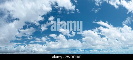 Stunning skyscape with cumulus clouds. Cloudy sky panorama. Stock Photo