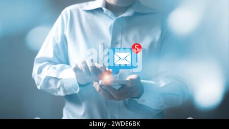 Business people touch on email in virtual screen. Inbox receiving electronic message alert. New email notification concept for business e-mail communi Stock Photo