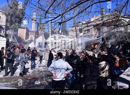 Damascus. 20th Jan, 2024. This photo taken on Jan. 20, 2024 shows a destroyed residential building in Damascus, Syria. Five officers of Iran's Islamic Revolutionary Guard Corps (IRGC) were killed in an Israeli missile attack on a residential neighborhood in the capital Damascus on Saturday, an Iranian media source told Xinhua. The targeted building was occupied by a unit affiliated with the IRGC in Iran, the Lebanon-based pan-Arab al-Mayadeen TV reported. Credit: Ammar Safarjalani/Xinhua/Alamy Live News Stock Photo