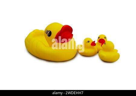 Mother rubber duck and ducklings on isolated background Stock Photo