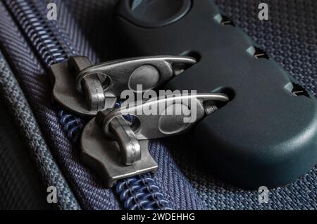 Close-up of a light blue travel suitcase combination lock Stock Photo