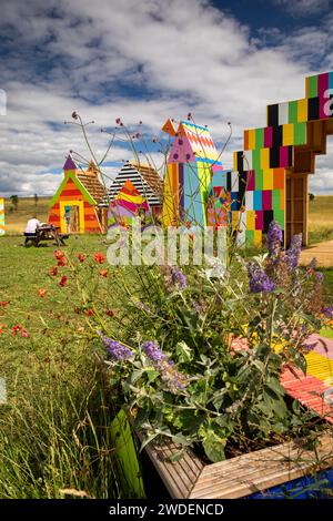 UK, England, Warwickshire, Compton Verney, Summer of Sculpture Old Town Meadow, floral planter in Morag Myerscough’s, colourful Village installation Stock Photo
