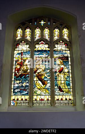 A stained glass window in the church of St Mary the Virgin, Gestingthorpe village in the Braintree district, Essex. Stock Photo