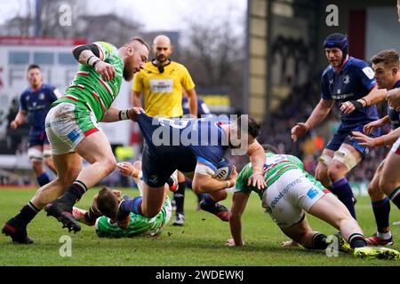 Leinster Rugby's Robbie Henshaw is held up by Leicester Tigers' Joe Heyes during the Investec Champions Cup match at Mattioli Woods Welford Road Stadium, Leicester. Picture date: Saturday January 20, 2024. Stock Photo