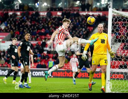 Stoke City's Nathan Lowe (left) and Birmingham City goalkeeper John Ruddy battle for the ball during the Sky Bet Championship match at the bet365 Stadium, Stoke. Picture date: Saturday January 20, 2024. Stock Photo