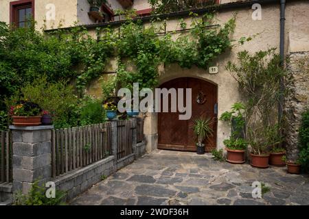 Dürnstein, Lower Austria – AT – June 8, 2023 Landscape view of one of the quaint shops along the picturesque stone streets of Dürnstein, a small town Stock Photo