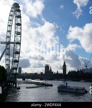 London on a blue cloudy day. London eye and Thames River Stock Photo