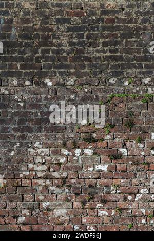 Old large weathered distressed brown stone red brick wall background, stock photo image Stock Photo