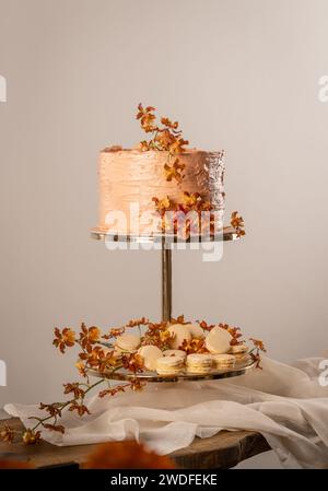 Pastel wedding sweet table setting. Macaron and wedding cake Stock Photo