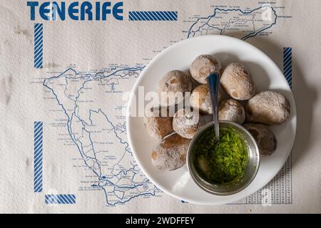 Papas arrugadas, wrinkled potatoes, in the traditional Canarian restaurant on Tenerife island, Spain. Stock Photo