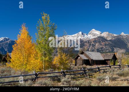 The Chapel of the Transfiguration, Episcopal with a back drop of the Grand Tetons mountain range in The Grand Tetons National Park, Wyoming, USA. Stock Photo