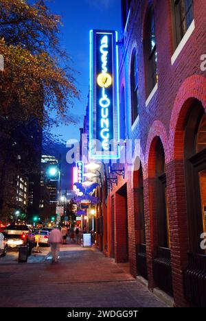 Austin, TX, USA November 10, 2010 The neon light of Aces Lounge illuminates the night on Sixth Street in Austin Texas, home to the city’s nightlife an Stock Photo