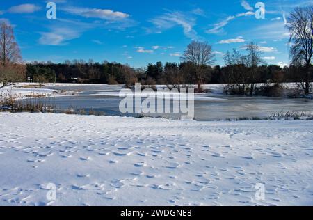 Pond in Bucks Mill Recreational area in Colt's Neck, New Jersey, on a cold, crisp, winter day, after some snowfall -02 Stock Photo