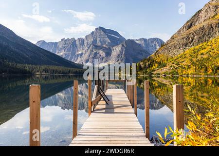 Lake Josephine reflecting the beautiful steep mountains of Glacier ...