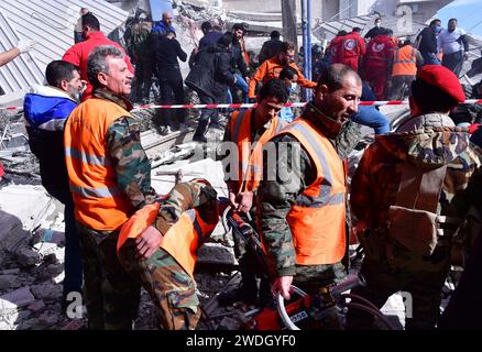 Damascus, Syria. 20th Jan, 2024. Rescuers work at the site of a collapsed building after an Israeli missile attack in the Mazzeh neighborhood of Damascus, Syria, Jan. 20, 2024. Earlier on Saturday, Iran's Islamic Revolutionary Guard Corps (IRGC) said that five of its members serving as military advisers in Syria as well as several Syrian forces and civilians were killed in the Israeli missile attack on the Mazzeh neighborhood of Damascus. Credit: Ammar Safarjalani/Xinhua/Alamy Live News Stock Photo