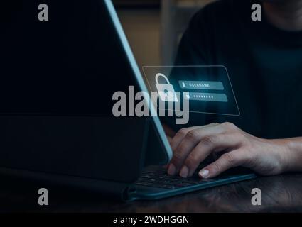 Cyber security concept. Sign in page on virtual screen while business person working with on digital tablet or laptop computer for validate password, Stock Photo