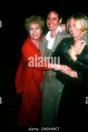 Los Angeles, California, USA 6th December 1996 (L-R) Actress Debbie Reynolds, Actor Rob Morrow and wife actress Debbon Ayer attend World Premiere of Paramount Pictures ÒMotherÓ on December 6, 1996 at Paramount Studios in Los Angeles, California, USA. Photo by Barry King/Alamy Stock Photo Stock Photo