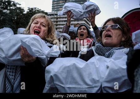 Barcelona, Spain. 20th Jan, 2024. A group of women raise dummies covered with blankets in the air pretending to be dead babies during the demonstration. Nearly 70,000 people marched through Barcelona to call for an immediate ceasefire in Gaza. (Photo by Ximena Borrazas/SOPA Images/Sipa USA) Credit: Sipa USA/Alamy Live News Stock Photo