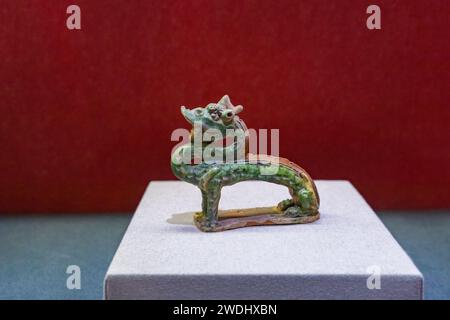 Chongqing, China. 21st Jan, 2024. A rare collection of cultural relics related to ''dragons'' is being displayed at the Three Gorges Museum in Chongqing, China, on January 20, 2024. The exhibition reportedly includes jade, bronze, pottery, porcelain, clothing, embroidery, stone carving, rubbings, New Year pictures, prints, paper cutting, and more. (Photo by Costfoto/NurPhoto) Credit: NurPhoto SRL/Alamy Live News Stock Photo