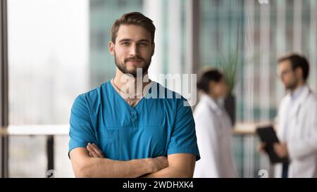Medical professional portrait of confident young surgeon doctor man Stock Photo