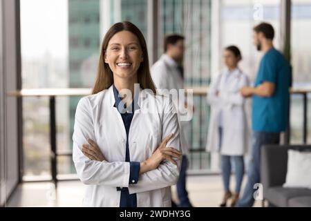 Happy confident beautiful doctor woman looking at camera Stock Photo