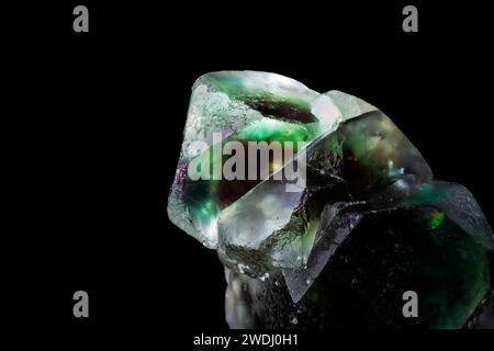 green fluorite (from erongo, namibia) photography isolated on black background. macro detail close-up rough raw unpolished semi-precious gemstone. Stock Photo