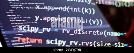SEO optimization. Modern tech. PHP syntax highlighted. Writing programming functions on laptop. Big data and Internet of things trend. Stock Photo