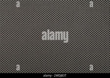 Gray background. Textile texture with small dots. Braided, knitting black threads. Stock Photo