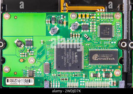 3.5 inch hard drives taken from vintage apple macintosh electronics data storage circuit boards Stock Photo