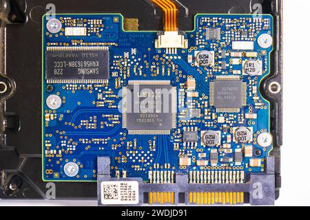 3.5 inch hard drives taken from vintage apple macintosh electronics data storage circuit boards Stock Photo