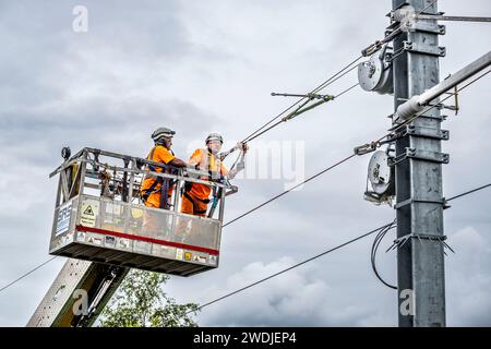 Overhead line maintenance on rail tracks Stock Photo