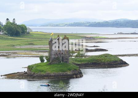 View of Castle Stalker along the west coast of Scotland Stock Photo