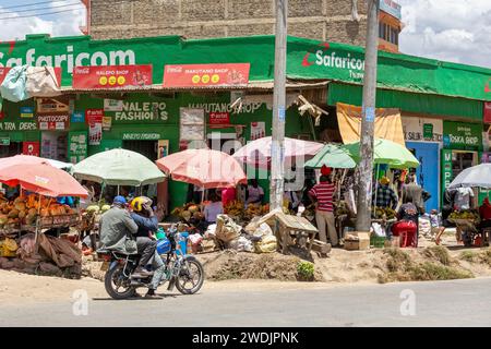 Narok, Kenya - 15 February 2019: A busy shopping street with fruit and vegetable market stalls, in the busy town of Narok,the district capital of the Stock Photo