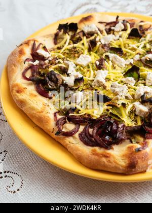 Home made vegan brussels sprouts pizza with red onions Stock Photo