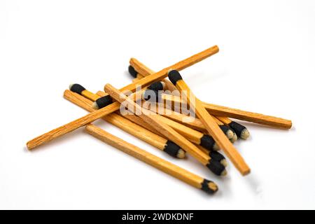 Group of long wooden matches isolated on white background. Stock Photo