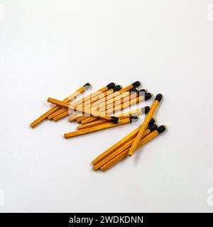 Group of long wooden matches isolated on white background. Stock Photo